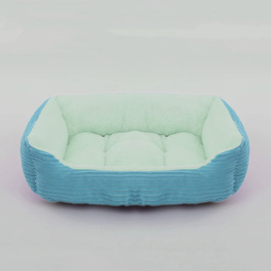 Grand panier pour chien XXL vert et bleu rembourré pour un moelleux de qualité supérieur. Panier style velour classe pour grand chien. image produit boutiquechien