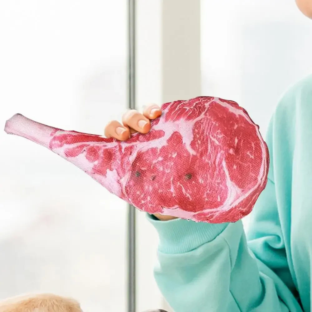 Jouet à mâcher chiot avec une main tenant le  produit 