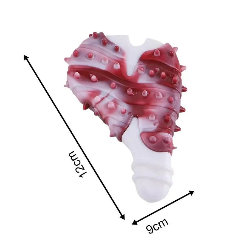 os résistant pour chien en forme de viande. Le jouet chien est de couleur rouge et blanc avec une dimension de 12 cm et 9cm. Image produit Boutiquechien
