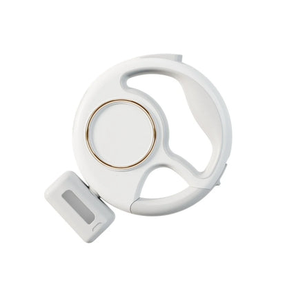 laisse design et ergonomique de couleur blanc. La laisse possède un sachet pour les excrément pour les chiens. Image produit Boutiquechien  