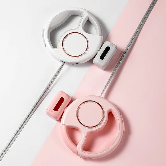 Laisse design pour chien de couleur rose et blanc. Laisse chien avec sachet à crotte. Image produit Boutiquechien