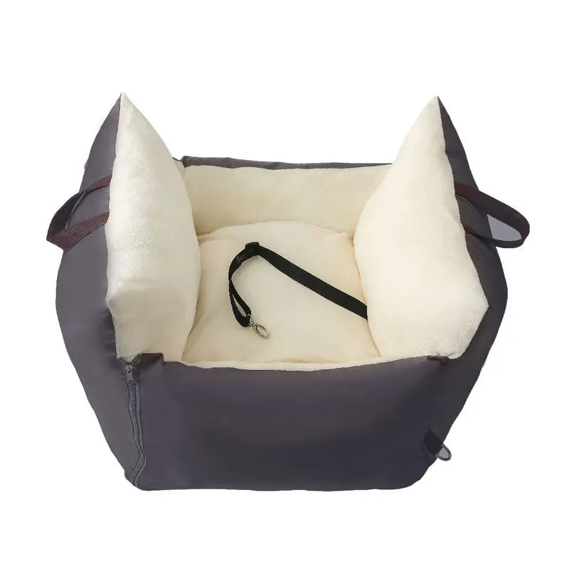 Panier pour chien de transcrit de couleur blanc et gris avec une laisse de maintient dans le sac. Image produit Boutiquechien