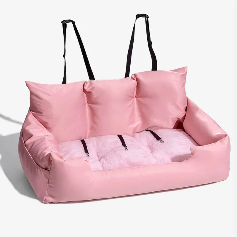 Panier de transport pour chien de couleur rose pour transport son chien confortablement avec ses coussins moelleux et ses trois laisses de sécurité. Image produit Boutiquechien