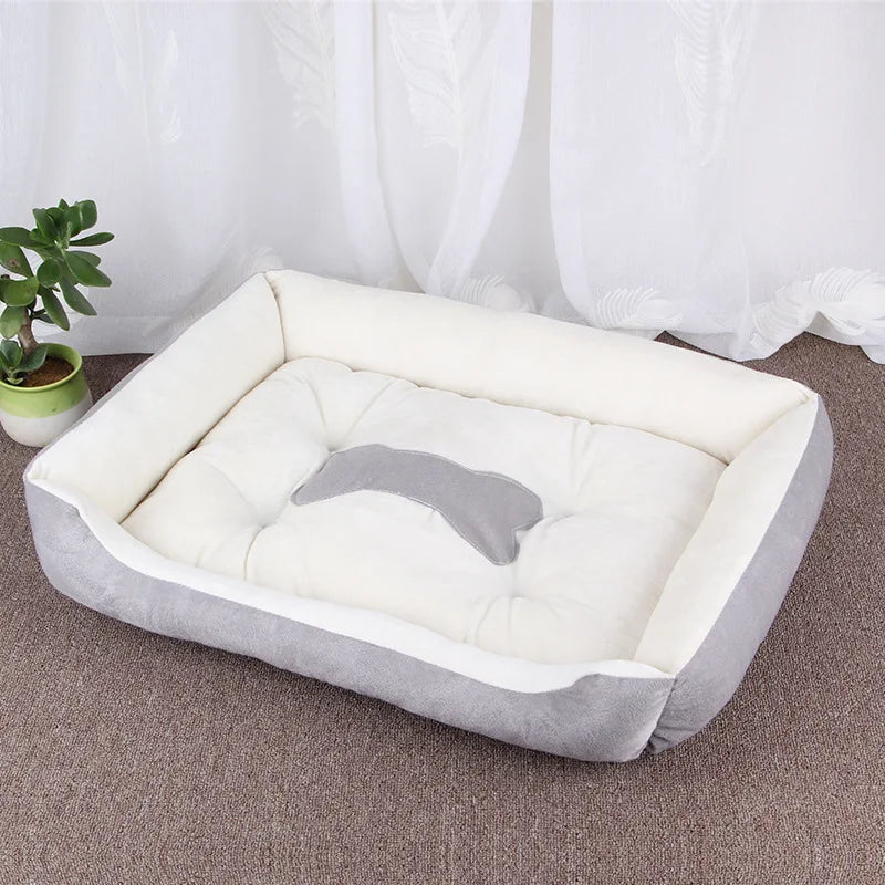 panier pour chien de couleurs gris et blanc avec motif d'os de couleurs gris. Le produit pour chien est de boutiquechien