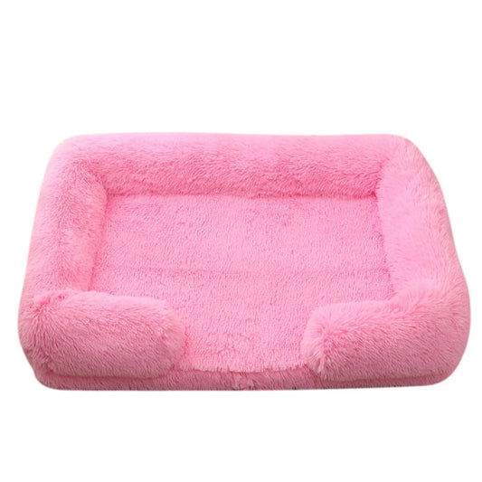 panier complètement rose avec des boudins qui font le tour du panier pour faire un oreiller. Image produit boutiquechien