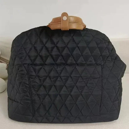 sac pour chien de couleur noir et élégant avec des poignées brun. Image produit Boutiquechien