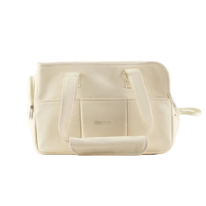 Sac pour transporter petit chien blanc de cote