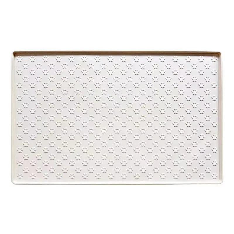 Tapis antiderapant gamelle chien de couleur blanc avec des pattes 