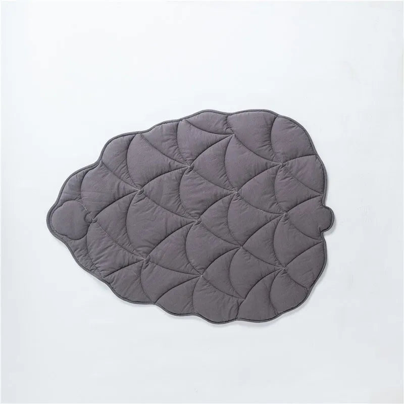 Tapis en forme de pomme de pain de couleur gris. Tapis design et élégant de Boutiquechien 