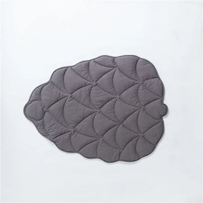Tapis en forme de pomme de pain de couleur gris. Tapis design et élégant de Boutiquechien 
