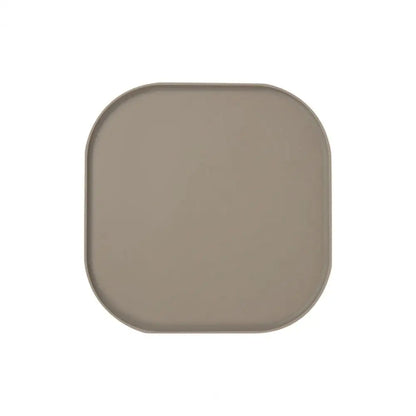 Tapis de protection gamelle de couleur marron  en silicone résistant dans un fond blanc. Image produit Boutiquechien