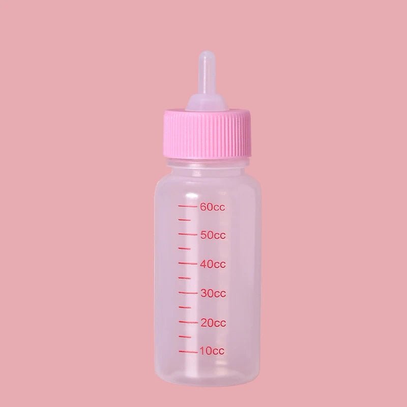 Biberon chiot avec écriture rouge et embout rose. Image produit Boutiquechien