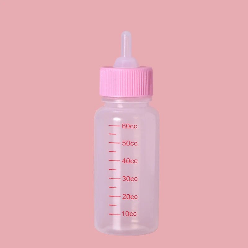 Biberon chiot avec écriture rouge et embout rose. Image produit Boutiquechien