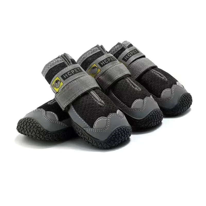 Bottes chaussures pour chien de couleur noir et grise en lot de 4. Image produit Boutiquechien 