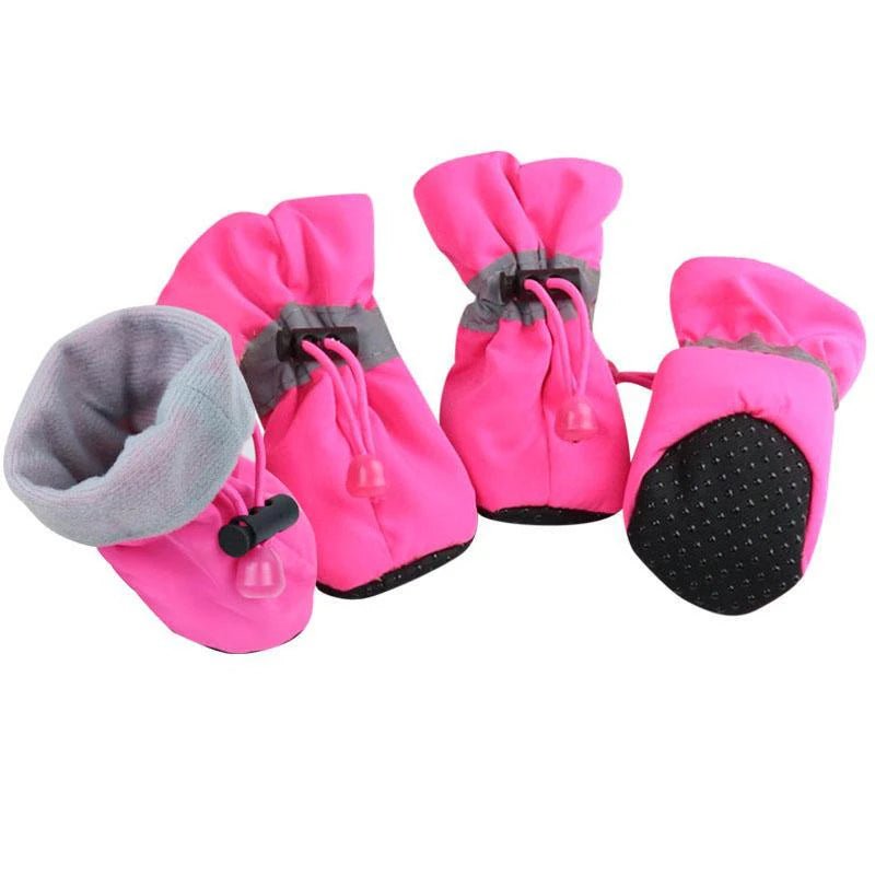 Bottes pour chiens de couleurs rose avec rembourrage gris. Les bottes servent pour les périodes hivernales. Image produit Boutiquechien
