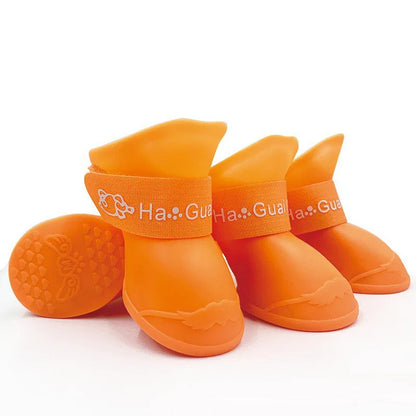 Bottes pour petits chiens de couleurs orange en caoutchouc imperméable. Image produit Boutiquechien