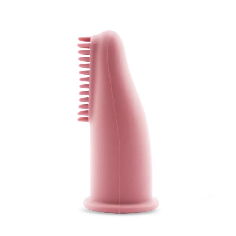 Brosse à dent pour chien de couleur rouge saumon claire à mettre au bout de son doigt pour brosser les dents de son chien. Image produit Boutiquechien