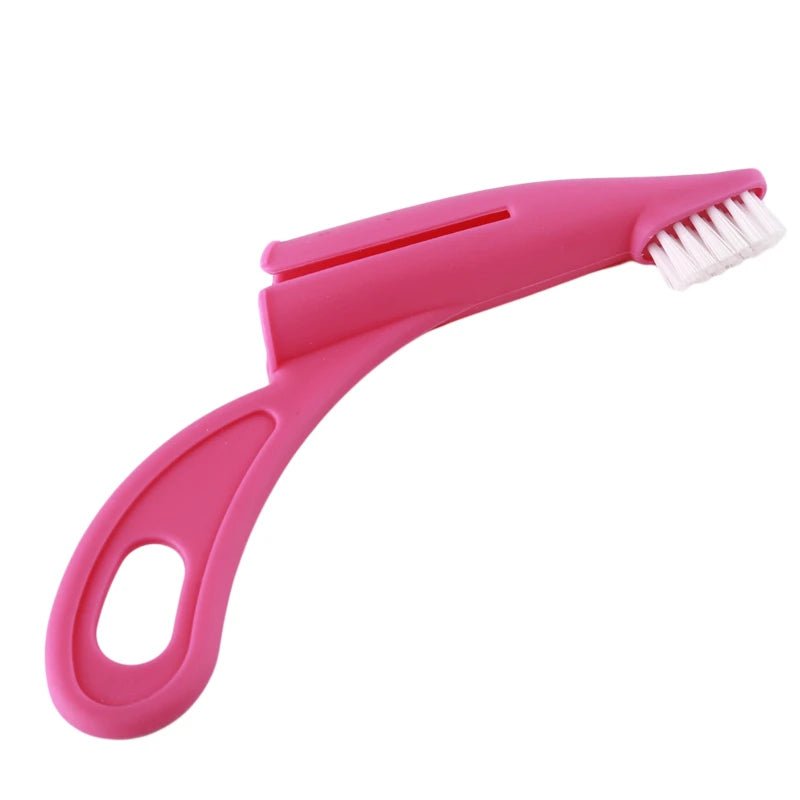 brosse a dent de couleur rose à mettre au bout de son doigt pour brosser les dents de son chien. Image produit Boutiquechien