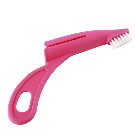 brosse a dent de couleur rose à mettre au bout de son doigt pour brosser les dents de son chien. Image produit Boutiquechien