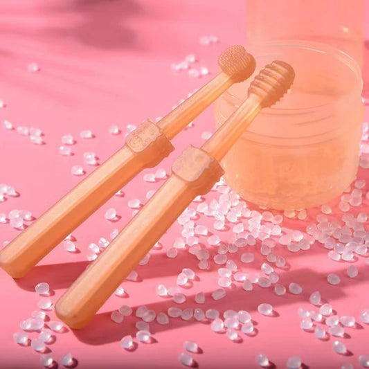 brosse a dent en caoutchouc de couleur orange avec boite pour chien. Image produit Boutiquechien