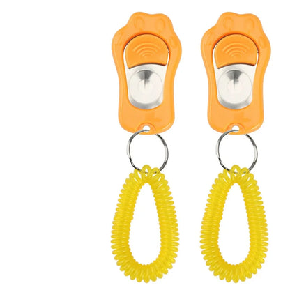 Clicker pour chien rouge avec maintien orange pour les chiens. Image produit Boutiquechien
