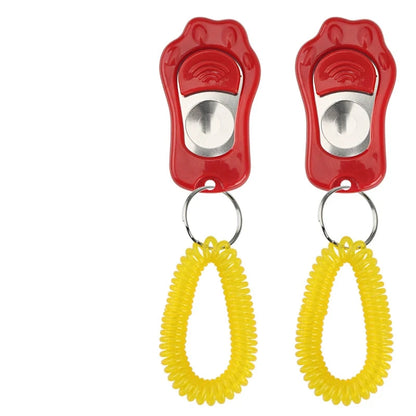 Clicker pour chien rouge avec maintien jaune pour les chiens. Image produit Boutiquechien