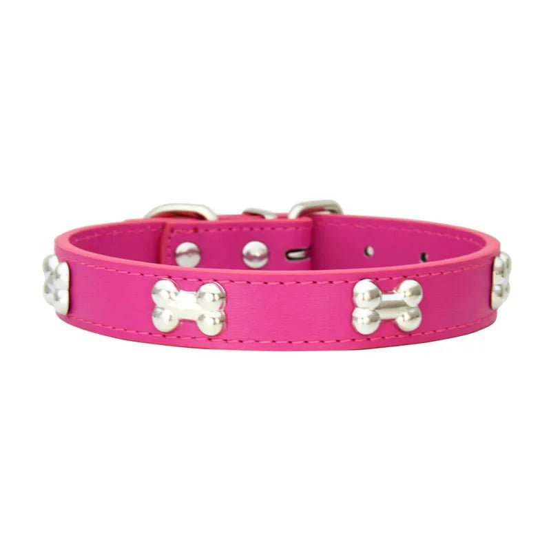 Collier style cuir de couleur rose pour chiot. Le collier possède des médaillons en forme d'os. Image produit Boutiquechien
