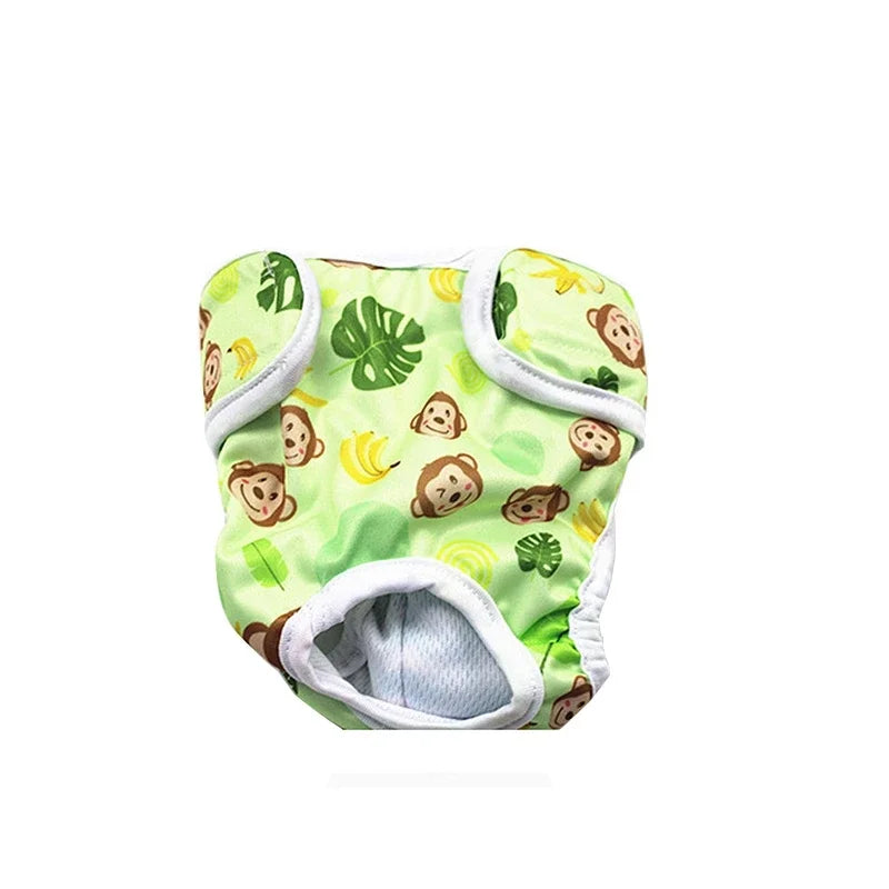 Couche pour chien de couleur verte avec des formes de singe. Image produit Boutiquechien