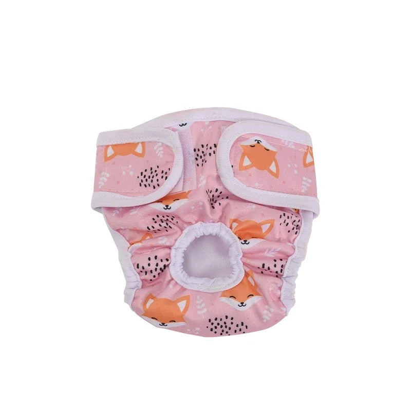 Couche pour chien de couleur rose avec des renards roux dessus. Image produit Boutiquechien