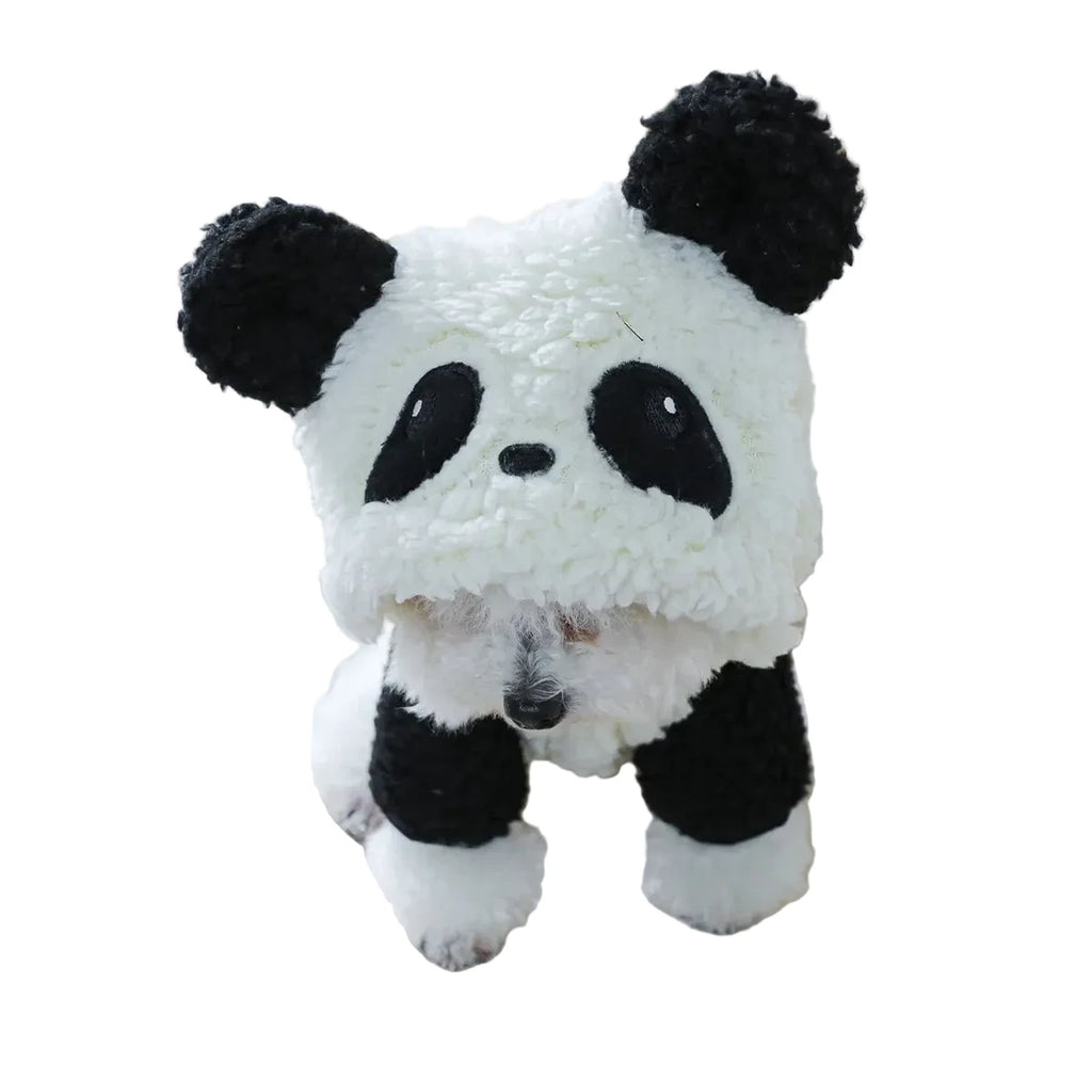 déguisement en forme de panda de couleur blanc et noir posé sur une table blanche. Image produit Boutiquechien