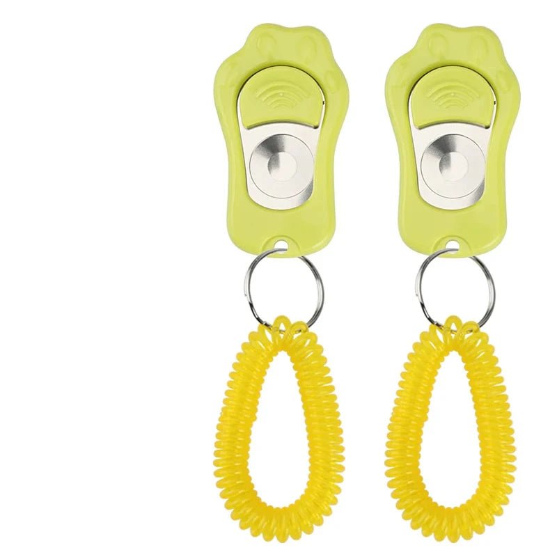 Clicker pour chien rouge avec maintien vert pour les chiens. Image produit Boutiquechien
