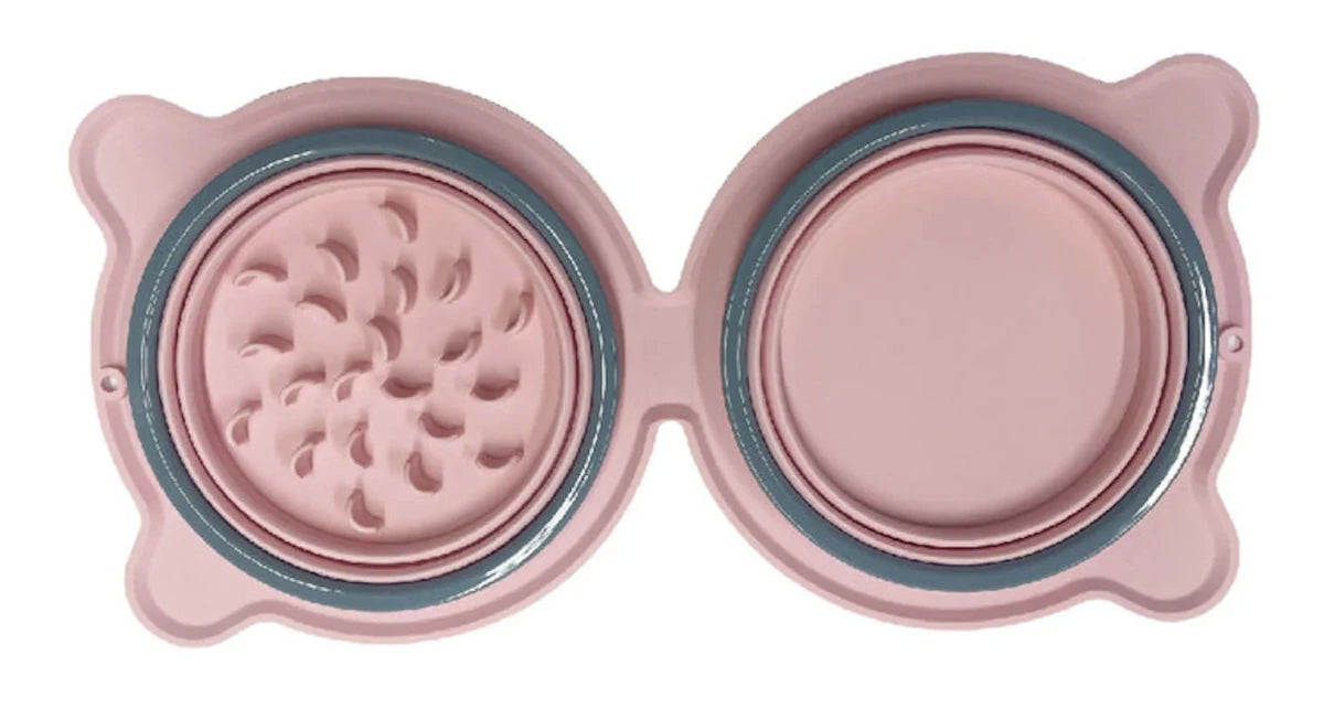 Gamelle pour chien pliante de couleur rose avec deux parties dépliante. Image produit Boutiquechien