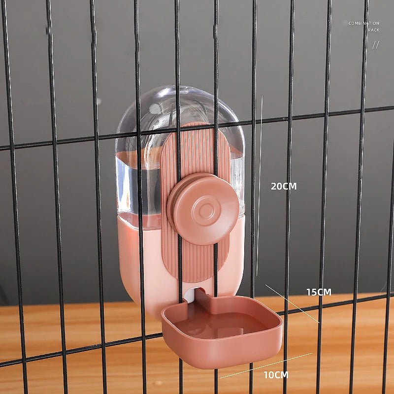 Gamelle eau de couleur rose avec toutes les dimensions sur un grillage noir. Image produit Boutiquechien