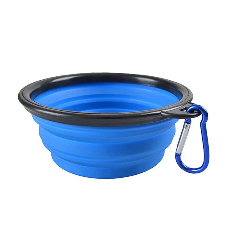 Gamelle pour chien de couleur bleu pliante transportable facilement dans un fond blanc. Image produit Boutiquechien