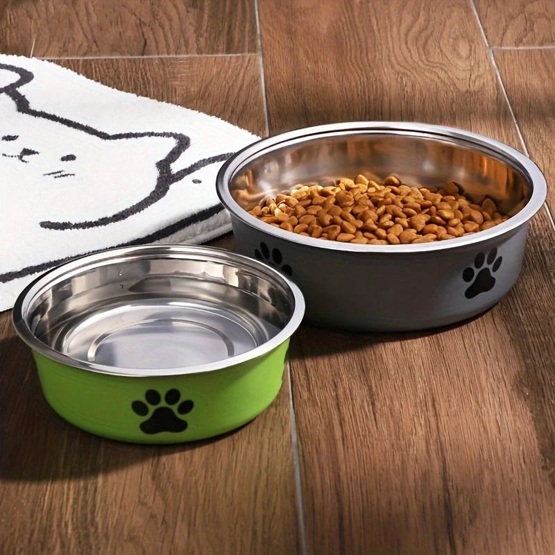 deux gamelles pour chien anti-dérapante en inox posé sur un parquet bois. Image produit Boutiquechien