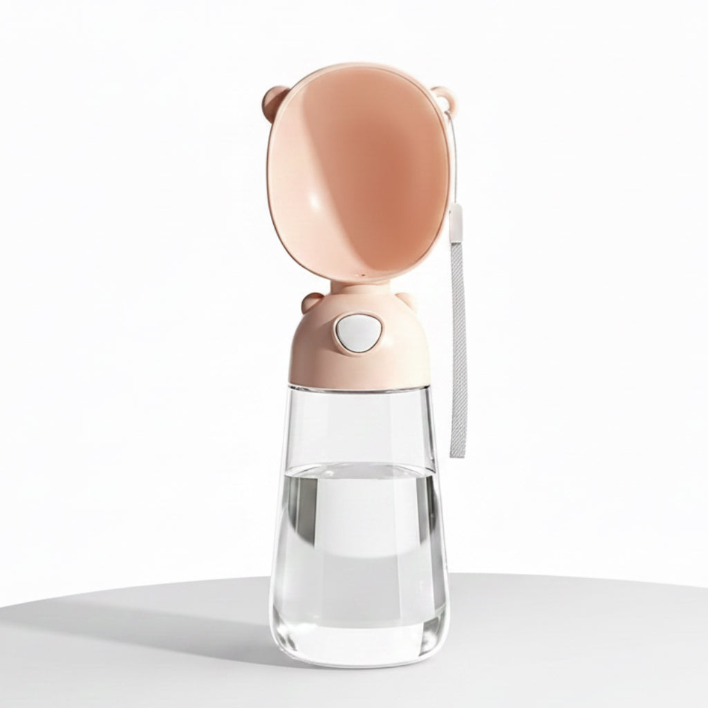 gourde d'eau pour chien de couleur abricot avec une capacité de 550 ml d'eau. le produit possède des dimensions du produit. Image produit Boutiquechien