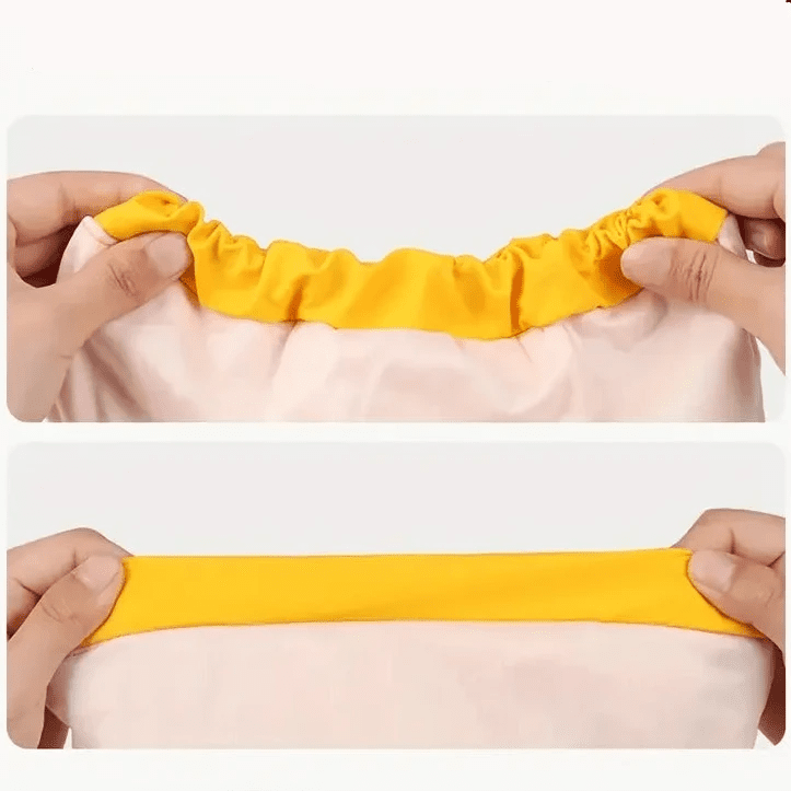 Extension de l'imper pour chien de couleur rose et jaune avec des mains le tenant. Image produit Boutiquechien