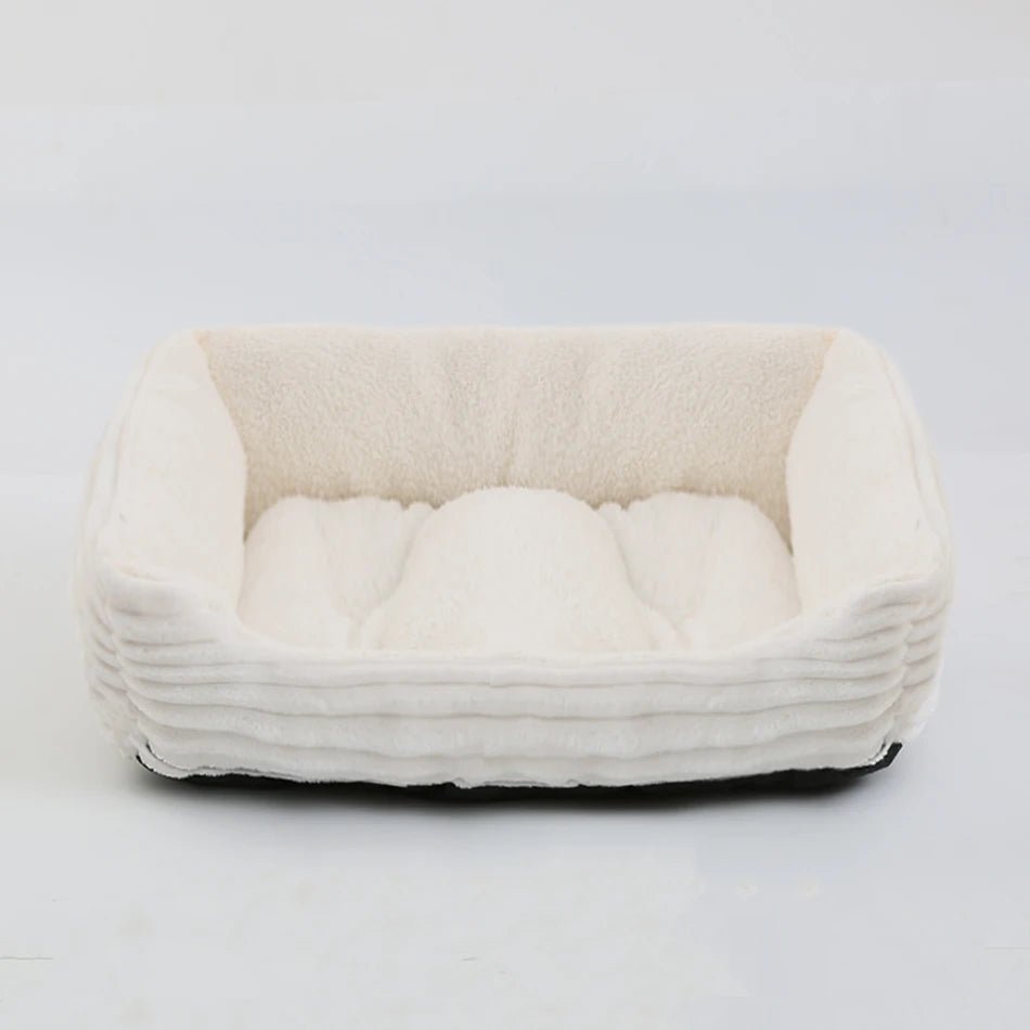 Grand panier pour chien XXL blanc rembourré pour un moelleux de qualité supérieur. Panier style velour classe pour grand chien. image produit boutiquechien