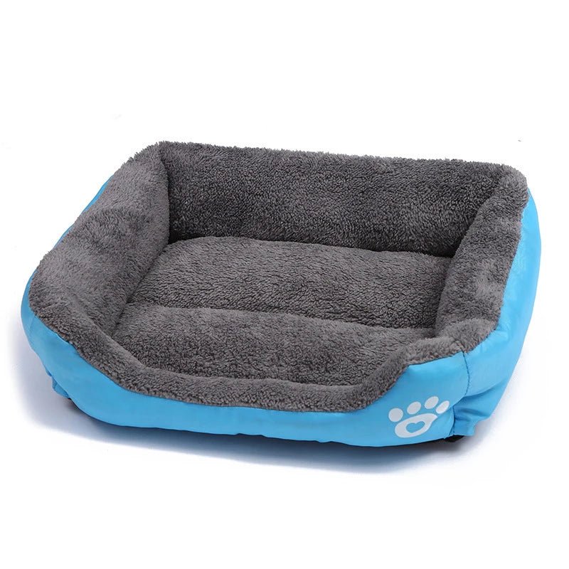 panier bleu pour chien de grande taille avec une patte sur le côté. Image produit pour boutiquechien 