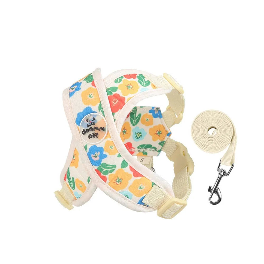 Harnais pour chiot de couleur beige avec des formes de fleurs rose. Image produit Boutiquechien