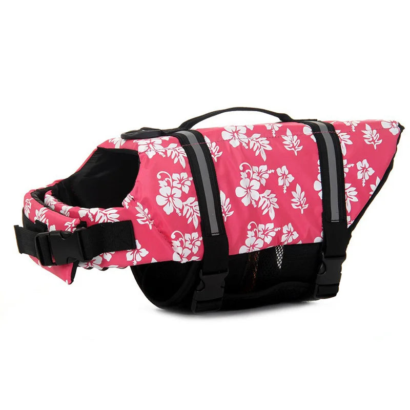 harnais de sauvetage pour chien rose à fleur blanc. Sur un harnais il y a une poignée de couleur noir avec des sangles noir. Image produit Boutiquechien