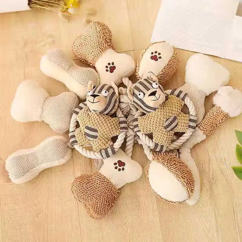 peluche chien de couleur claire posé les uns sur les autres. Image produit Boutiquechien