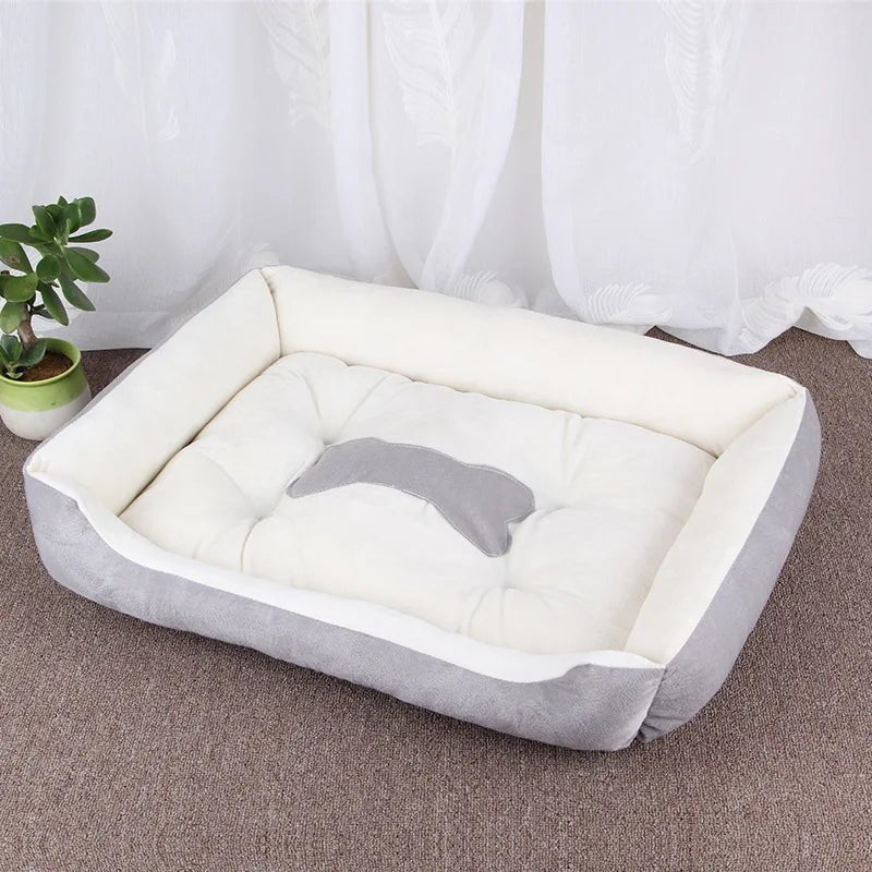 panier pour chien de couleurs gris et blanc avec motif d'os de couleurs gris. Le produit pour chien est de boutiquechien