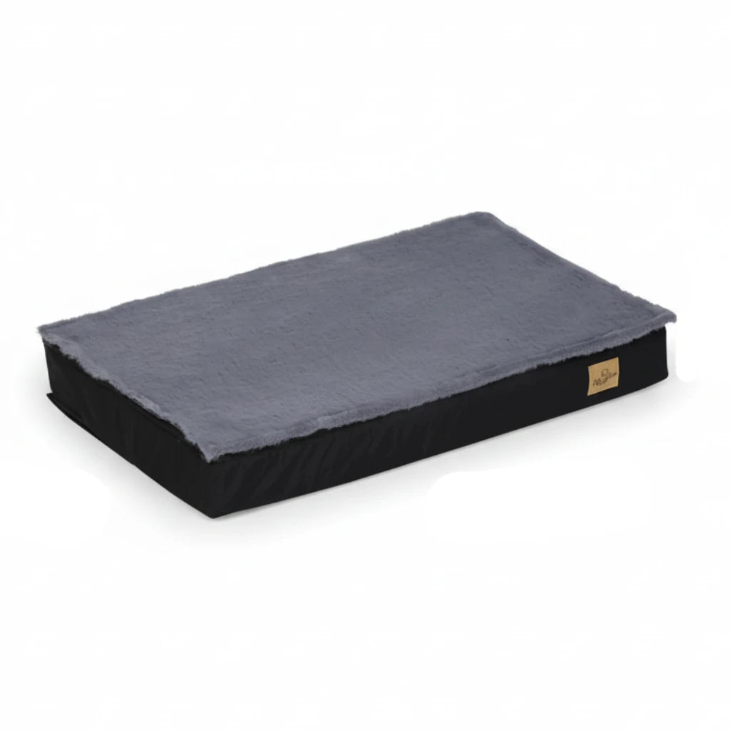 Panier pour chien incontinente de couleur noir dans un fond blanc