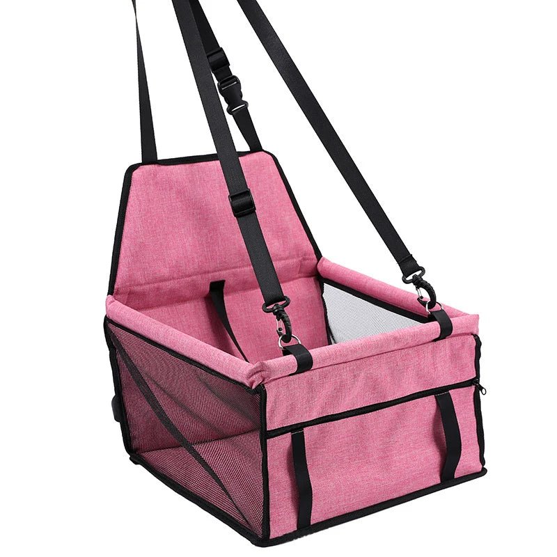 Panier de transport pour chien de couleur rose avec de nombreuses sangle d'attache. image produit Boutiquechien