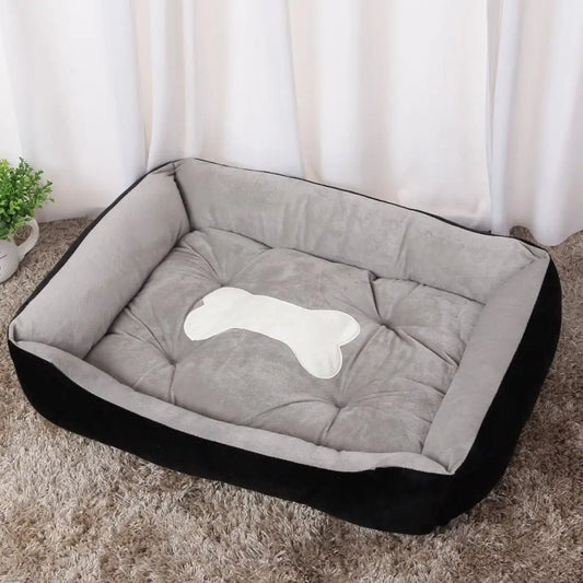 panier pour chien de grande taille pour chien. Panier de couleur gris et noir avec motif d'os dans le panier. Image produit boutiquechien