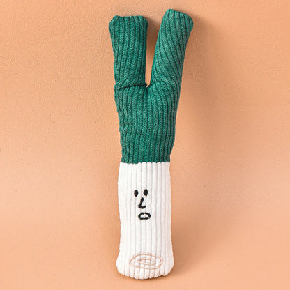Peluche en forme de poireau de couleur vert et blanc pour chien de boutiquechien