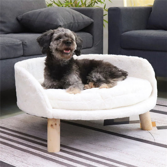 Canape chien surélevé Blanc avec un chien de couleur noir près de deux canapé noir. Image produit Boutiquechien