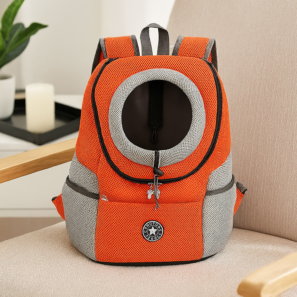 sac à dos de transport pour chien de couleur orange et gris posé sur un siège de couleur gris. Image produit Boutiquechien Image
