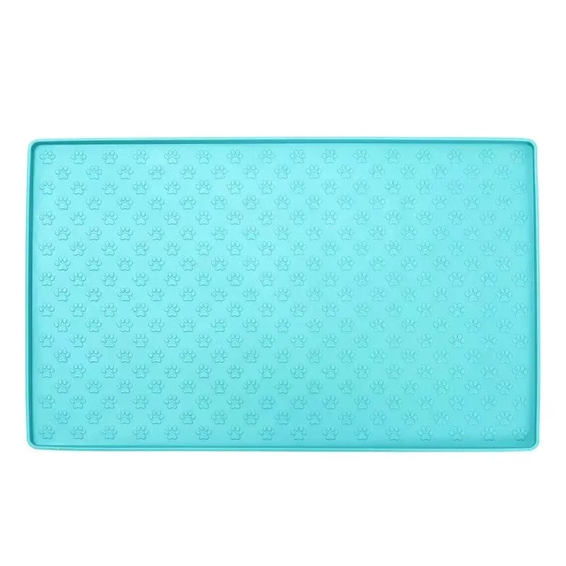 Tapis antiderapant gamelle chien de couleur bleu avec des pattes bleus 